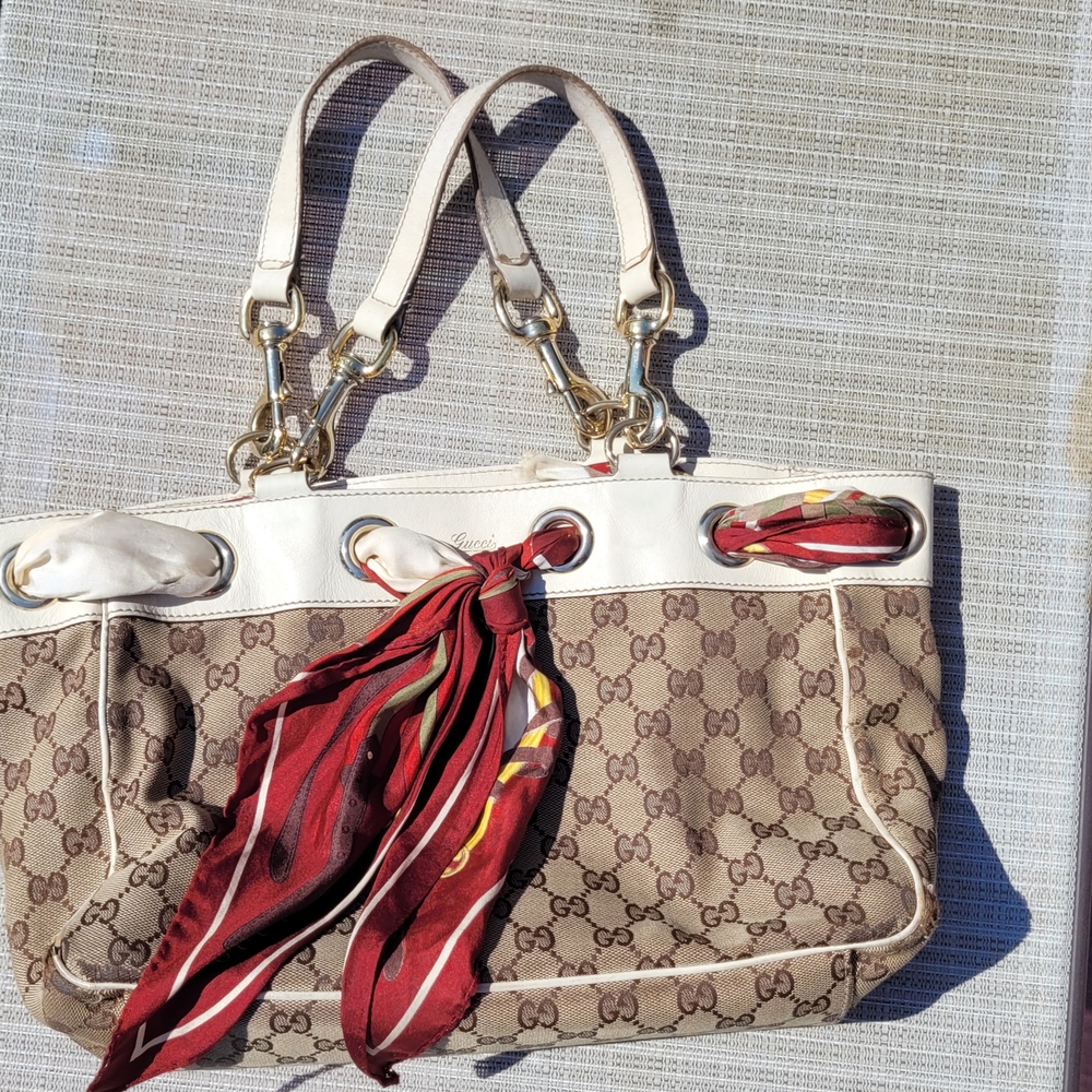 Gucci Vintage Monogram Handbag With Gold Hardware